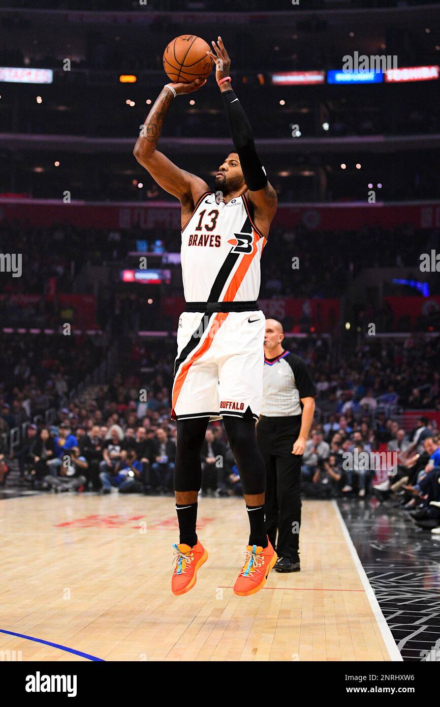 LOS ANGELES, CA - DECEMBER 03: Los Angeles Clippers Guard Paul George (13)  shoots a three pointer during a NBA game between the Portland Trail Blazers  and the Los Angeles Clippers on