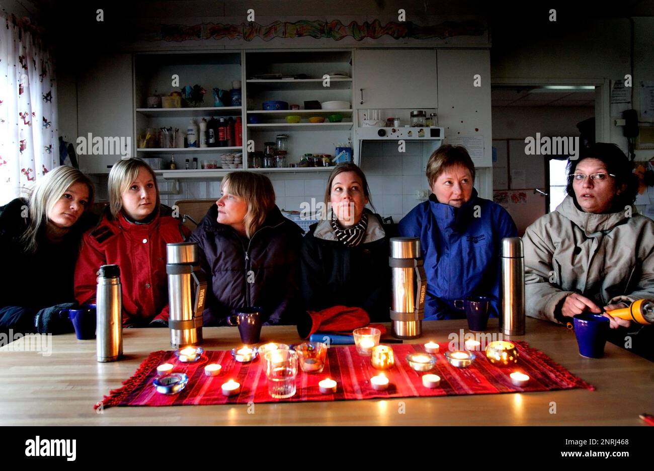 After the storm Per. Staff during a power outage at Grebo preschool, at Grebo preschool, Grebo, Sweden. Stock Photo