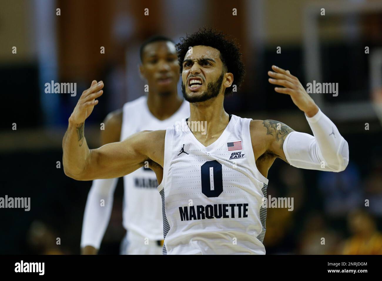 ORLANDO, FL - NOVEMBER 29: Marquette Golden Eagles guard Markus Howard (0)  celebrates after scoring during the 2019 Orlando Invitational mens college  basketball game between the USC Trojans and Marquette Golden Eagles