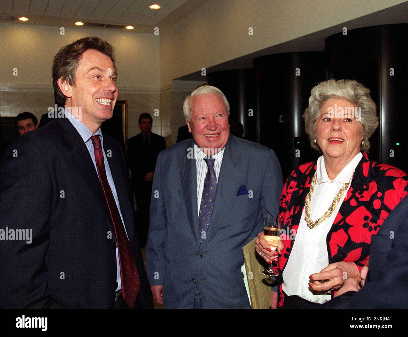 File photo dated 25/01/00 of the former Tory Prime Minister Edward Heath (centre) with the then Prime Minister Tony Blair (left), who unveiled a portrait by Jane Bond of the Speaker of the House of Commons Betty Boothroyd (right), at a reception in No.1 Parliament Street, Westminster. Baroness Betty Boothroyd, the first woman to be Speaker of the House of Commons, has died, according to current Speaker Sir Lindsay Hoyle, who said she was 'one of a kind'. Issue date: Monday February 27, 2023. Stock Photo