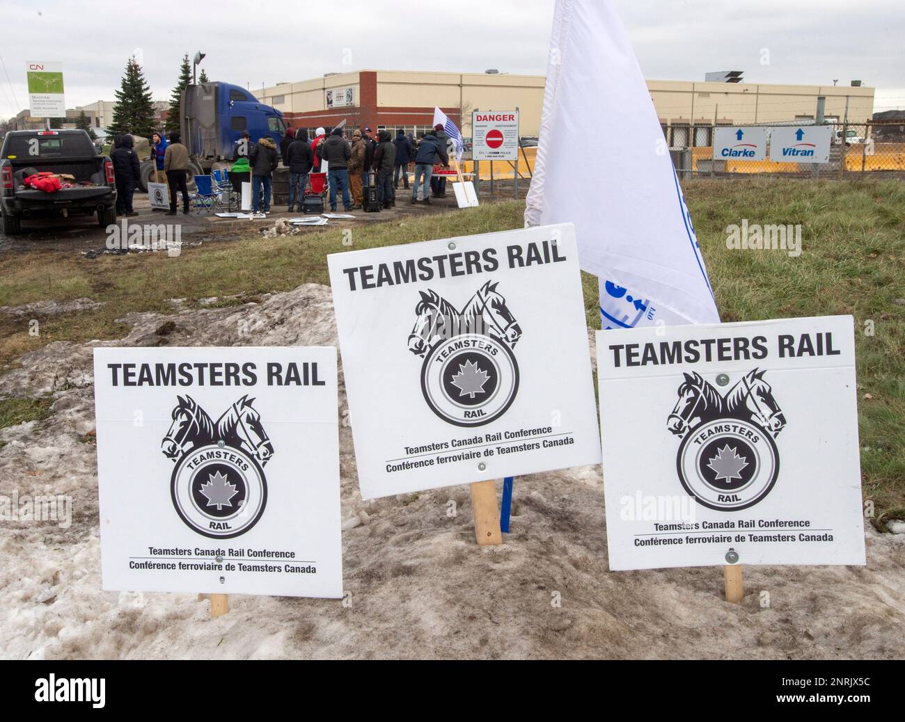 Striking Canadian National Railway workers picket in front of the ...