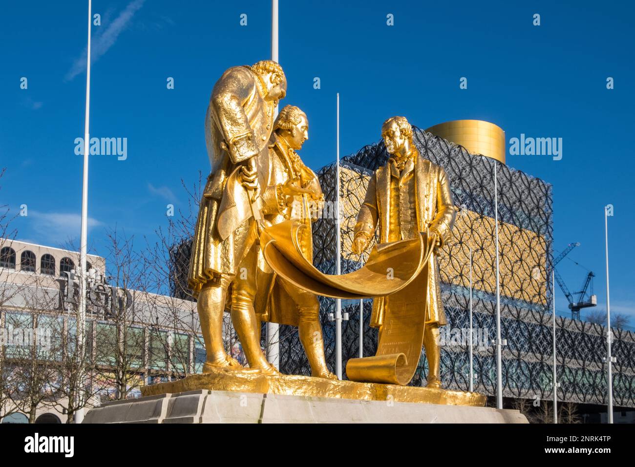 The 'Golden Boys' in Birmingham is a gilded bronze statue commemorating Matthew Boulton, James Watt and William Murdoch by William Bloye Stock Photo