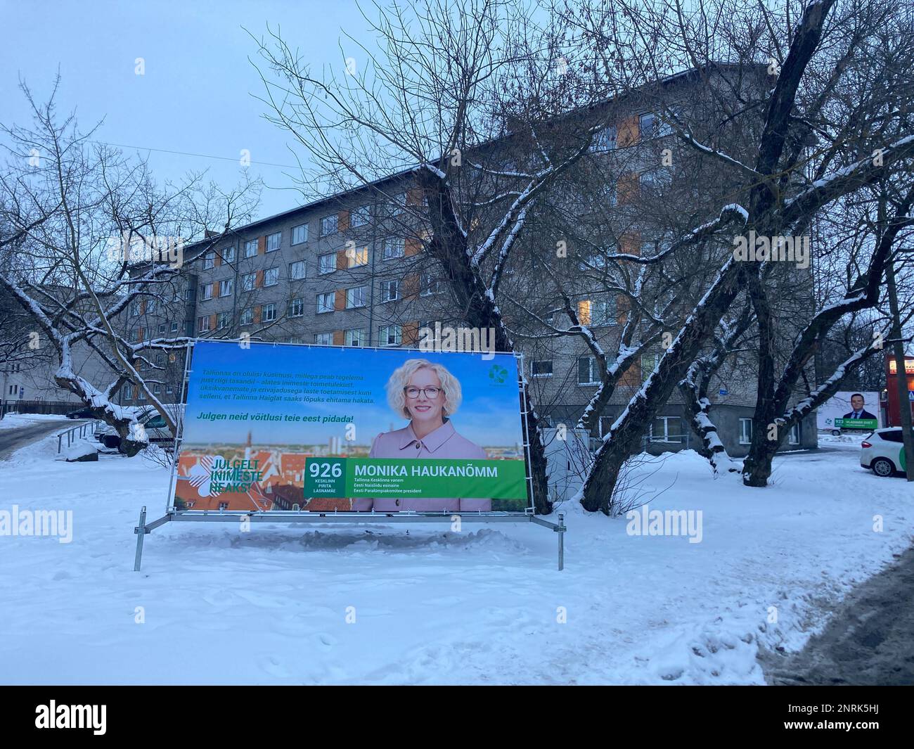 Tallinn, Estonia. 24th Feb, 2023. An election poster of a candidate from the opposition Center Party stands in front of a residential building. In 2007, Estonia was the first European country to introduce the option of voting via the Internet in parliamentary elections. In the election four years ago, more than a quarter of all eligible voters put their crosses online. (to dpa 'E-voting and advance voting in parliamentary elections in Estonia') Credit: Alexander Welscher/dpa/Alamy Live News Stock Photo