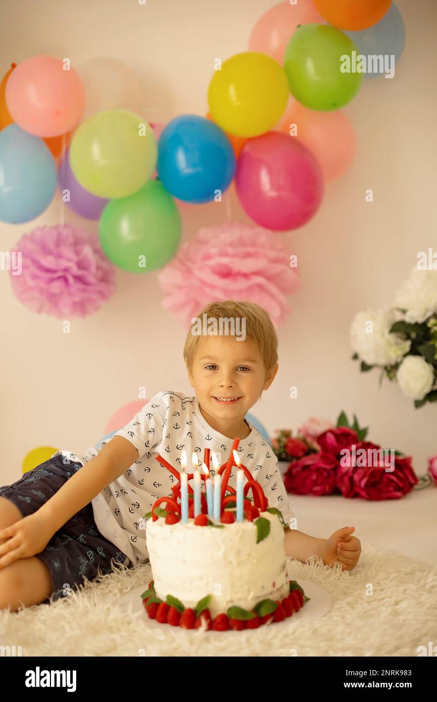 Cute child, preschool boy, celebrating birthday at home with ...