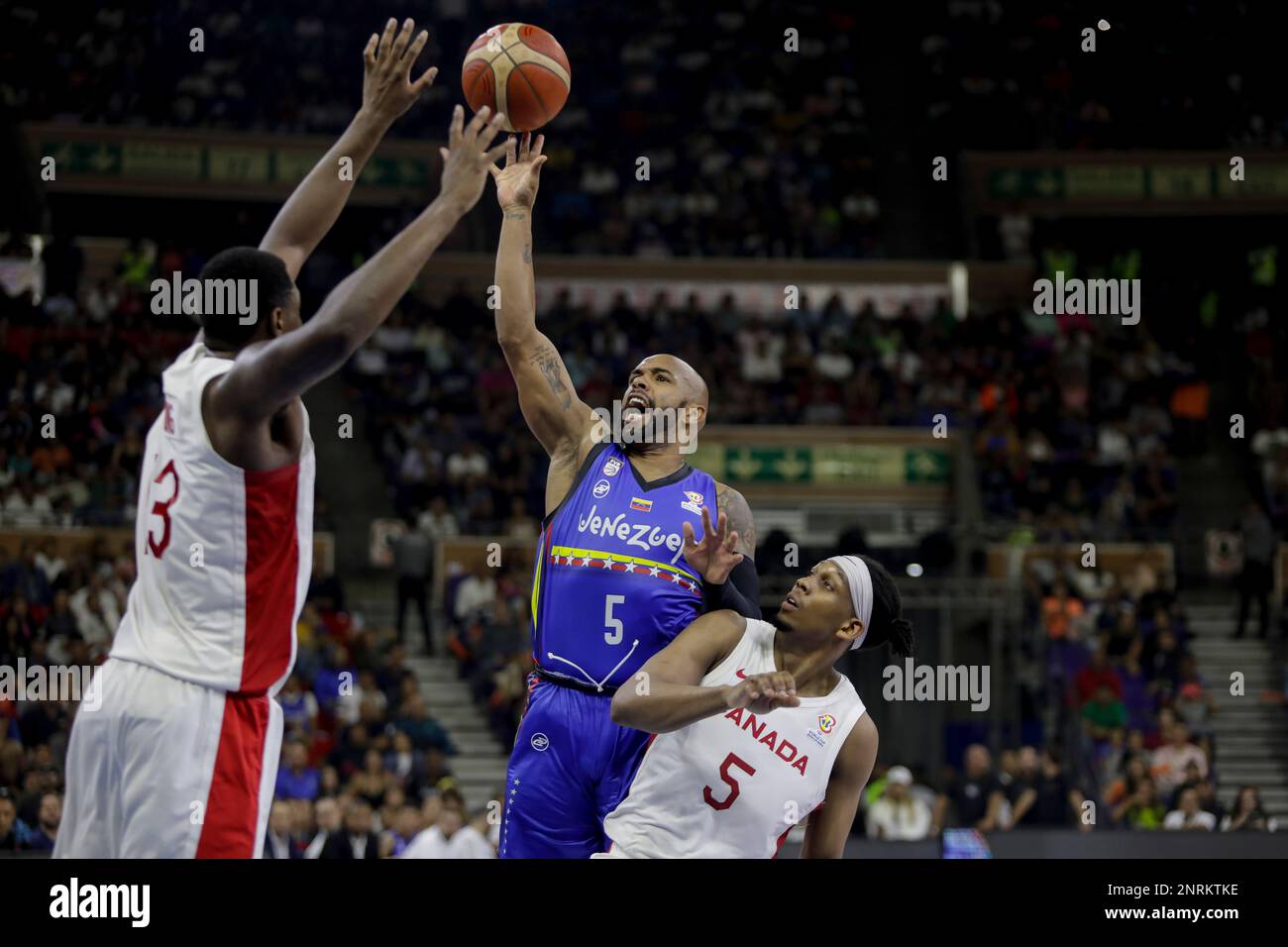 CARACAS, VENEZUELA - FEBRUARY 26: Gregory Vargas of Venezuela shoots to score against Canada during the Americas qualifiers for the FIBA Basketball World Cup 2023 basketball game, at Poliedro de Caracas, in Caracas, Venezuela, on February 26, 2023. (Photo by Pedro Rances Mattey/Pximages) Credit: Px Images/Alamy Live News Stock Photo