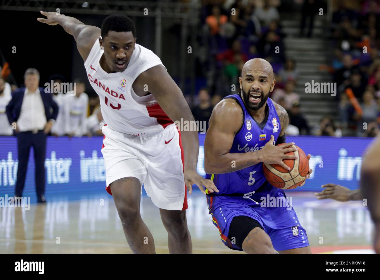 CARACAS, VENEZUELA - FEBRUARY 26: Gregory Vargas of Venezuela competes for the ball with Kalif Young of Canada during the FIBA Basketball World Cup 2023 Americas Qualifiers basketball game, Poliedro de Caracas, in Caracas, Venezuela, on February 26 February 2023. Credit: Px Images/Alamy Live News Stock Photo