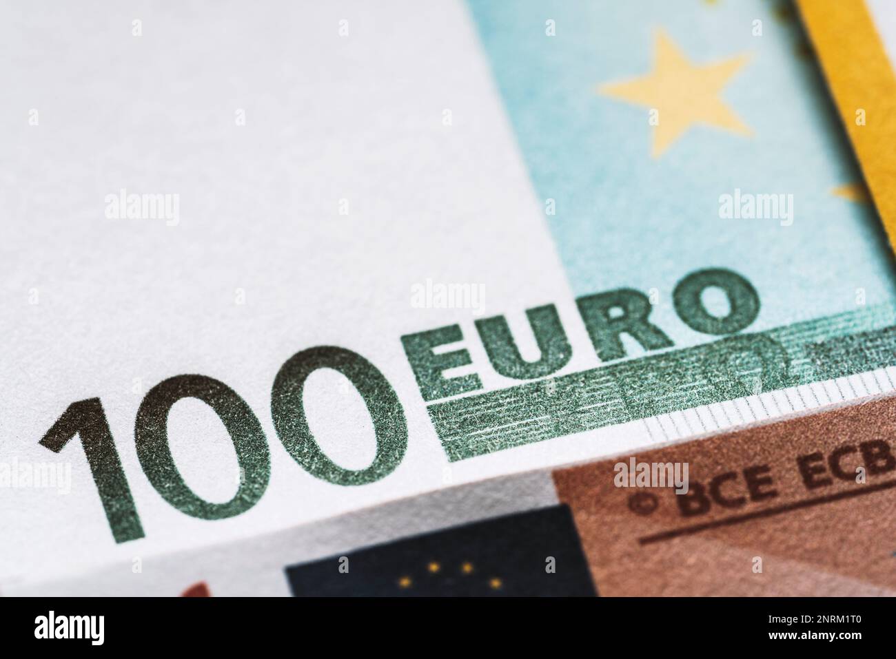 One hundred euro banknote close up detail. European Union currrency ...