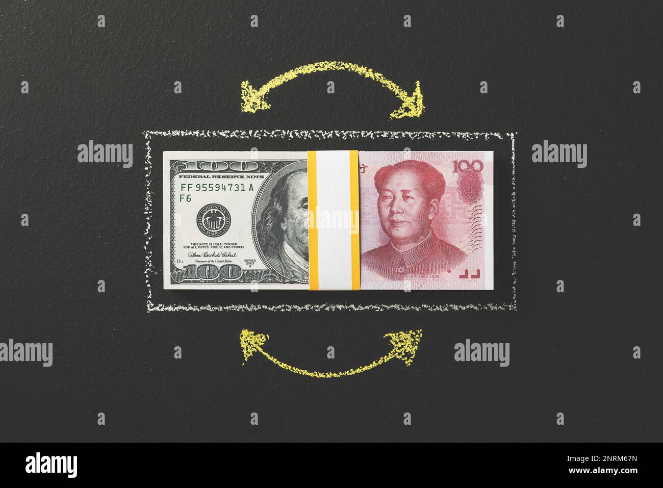 International stock exchange currency, Dollar to Chinese yuan. Currency convertion, exchange rates, foreign exchange market. Stock Photo
