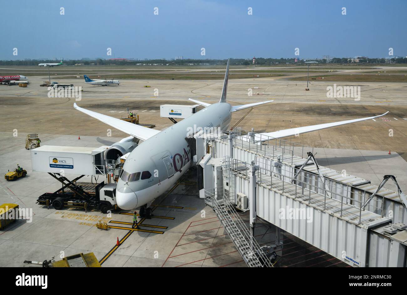 HONG KONG SAR,CHINA. FEBRUARY 16th, 2023.  A Qatar plane sits on the tarmac at Tan Son Nhat International Airport Ho Chi Minh City. Stock Photo