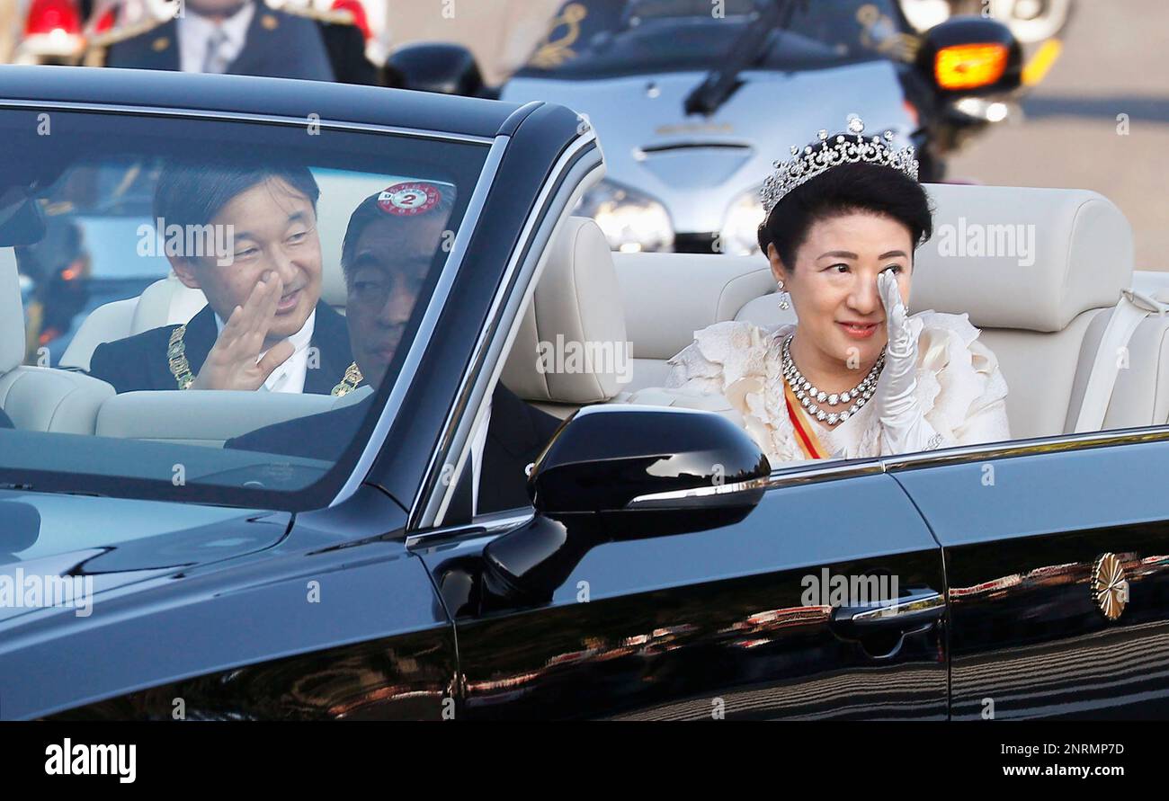 Japan's Emperor Naruhito and Empress Masako greet well-wishers from an ...