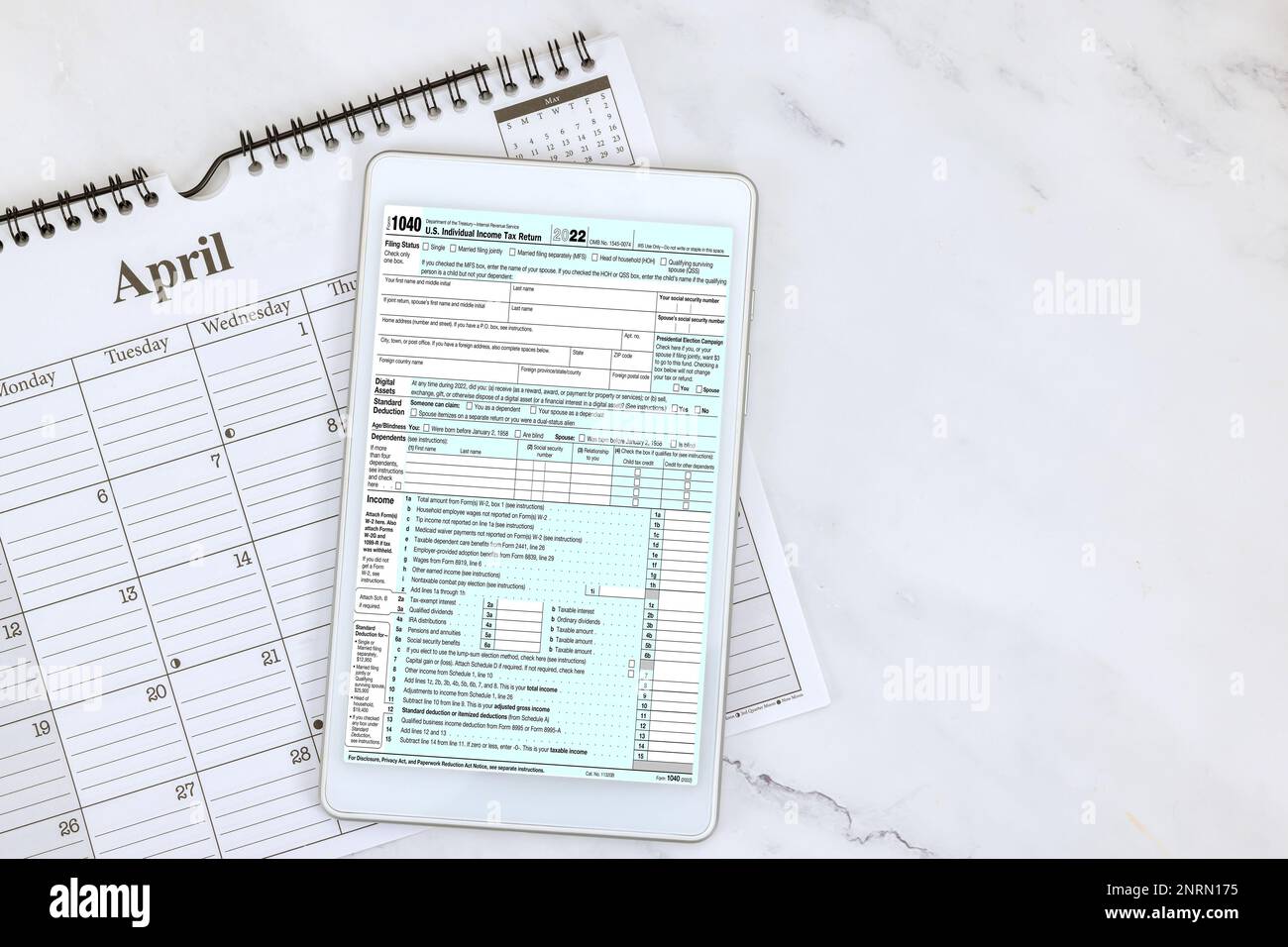 It is time of year for US citizens to file their federal income tax returns using 1040 form Stock Photo