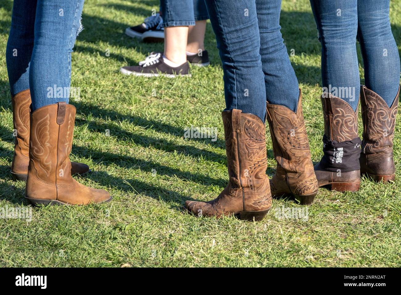People wait for the dedication of the Borderline Healing Garden at