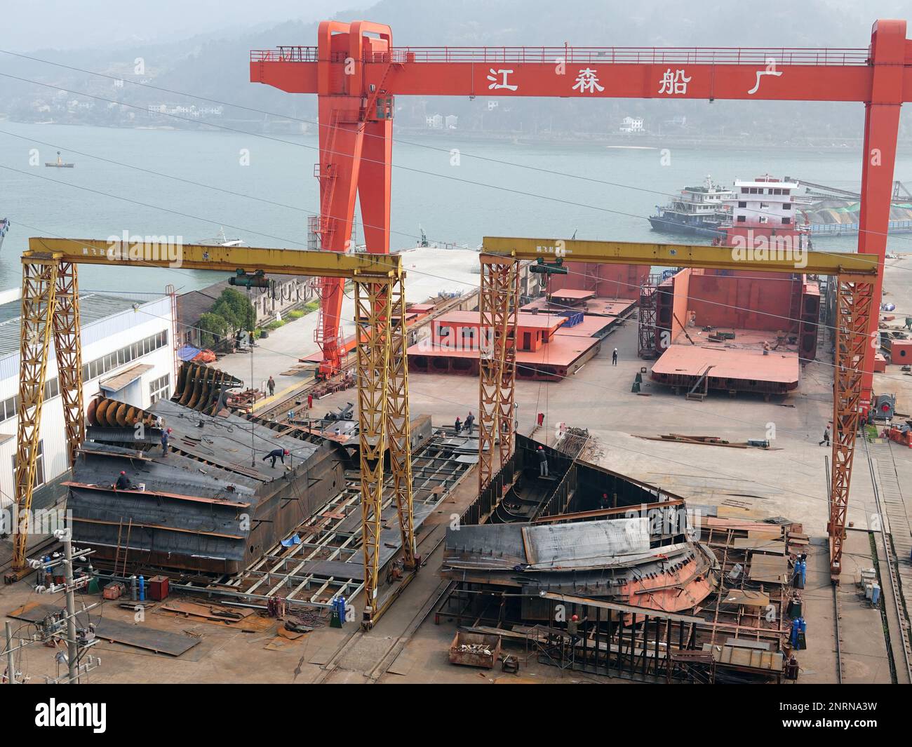 YICHANG, CHINA - FEBRUARY 27, 2023 - Shipyard workers build ships in ...