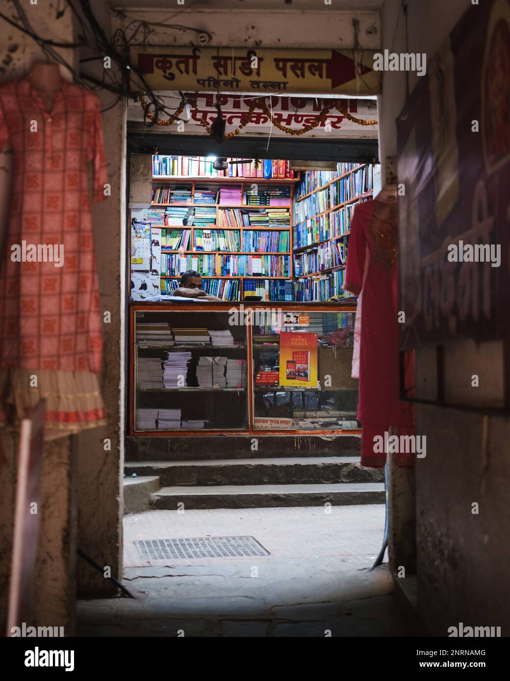 Kathmandu, Nepal, 04 23 2022 A man sitting in his book store in