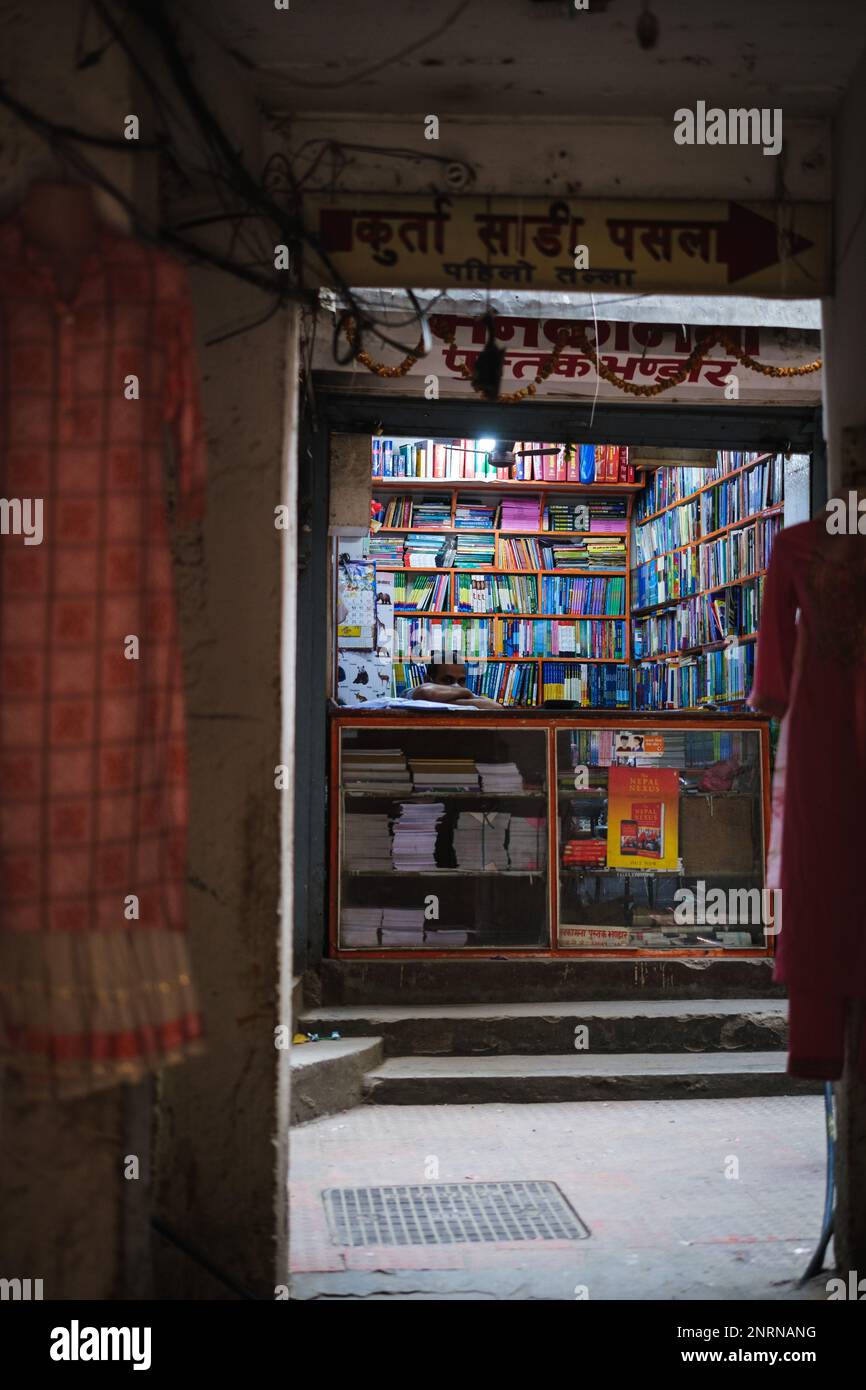 Kathmandu, Nepal, 04 23 2022 A man sitting in his book store in