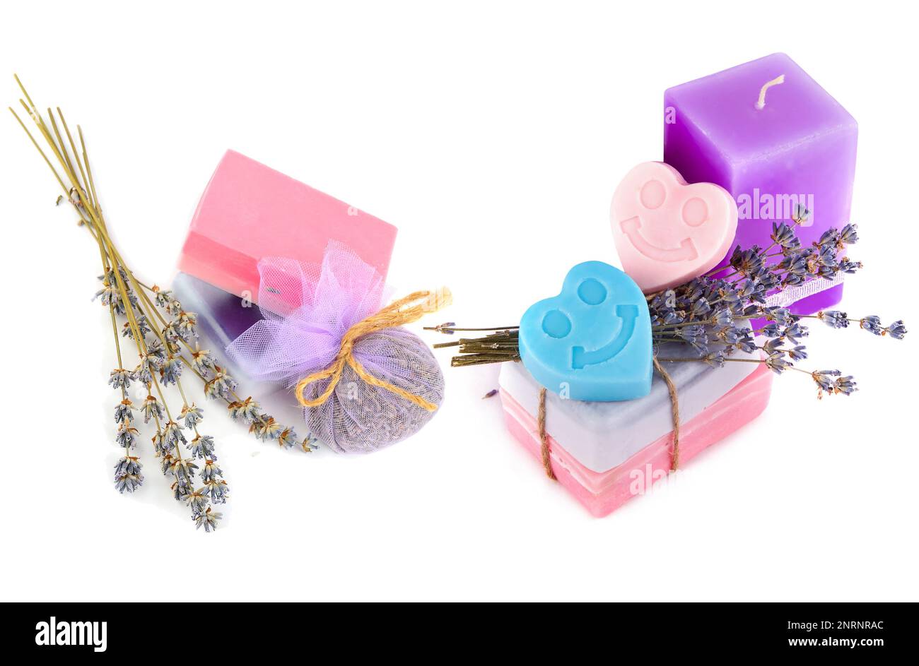 Soap, scented candle and dry lavender flowers isolated on white