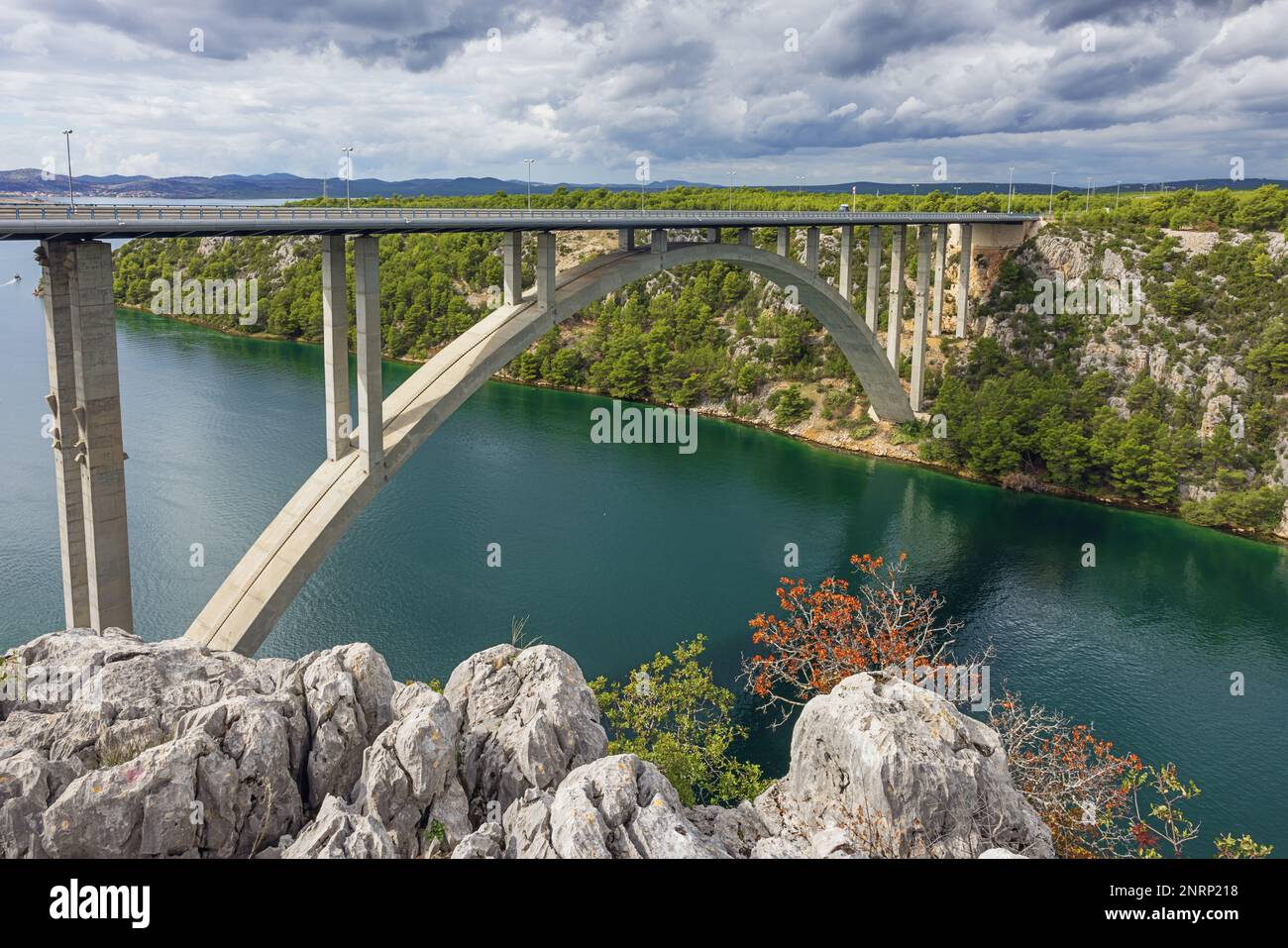 The highway bridge over the Krka River next to Skradin Stock Photo