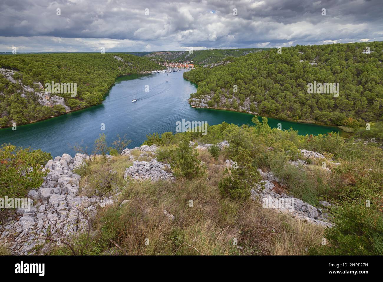The mouth of the Krka River with Skradin in a distance Stock Photo