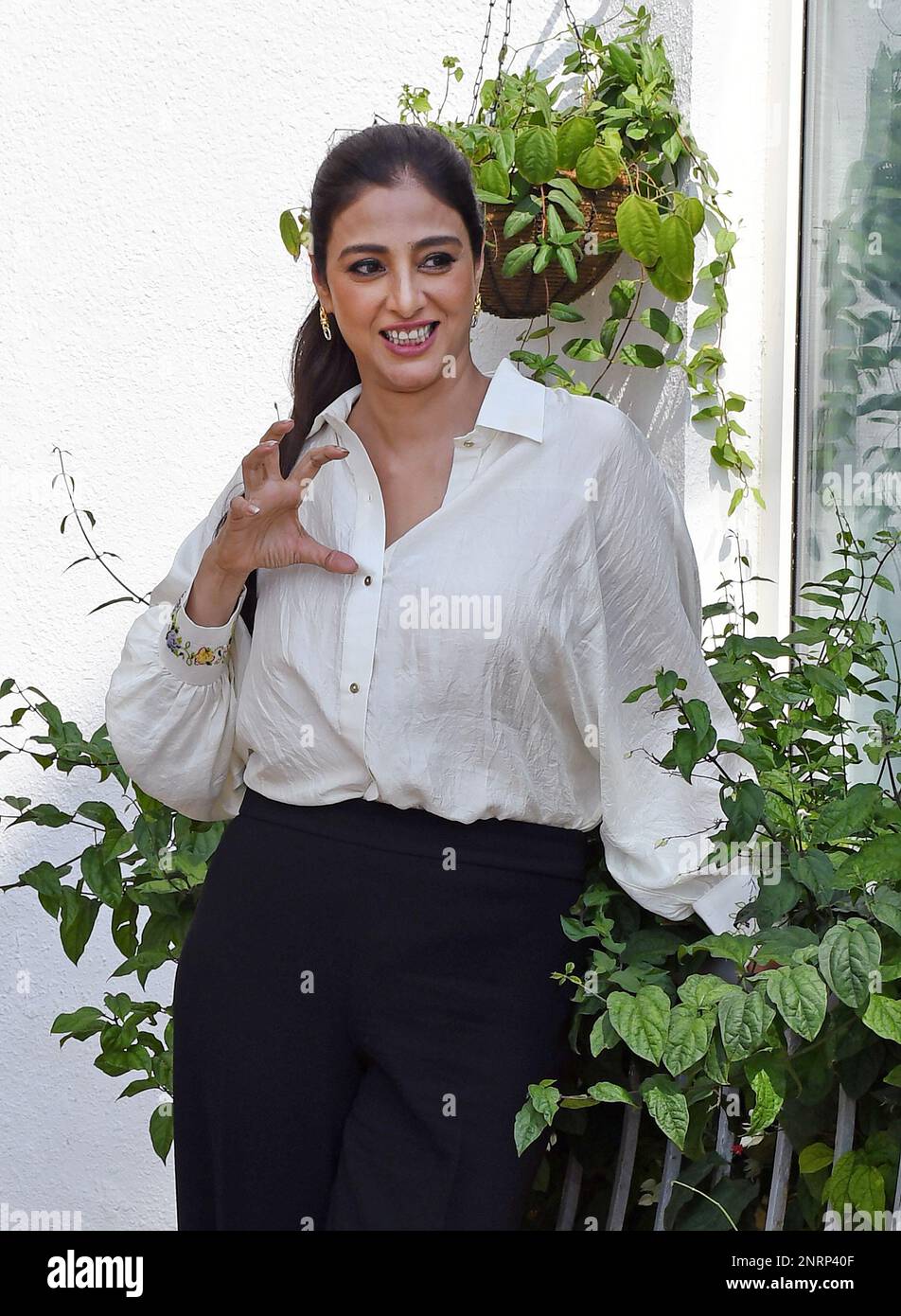 Mumbai, India. 27th Feb, 2023. Bollywood actress Tabu gestures during the promotion of her upcoming film 'Bholaa' in Mumbai. The film will be release on 30th March 2023. Credit: SOPA Images Limited/Alamy Live News Stock Photo
