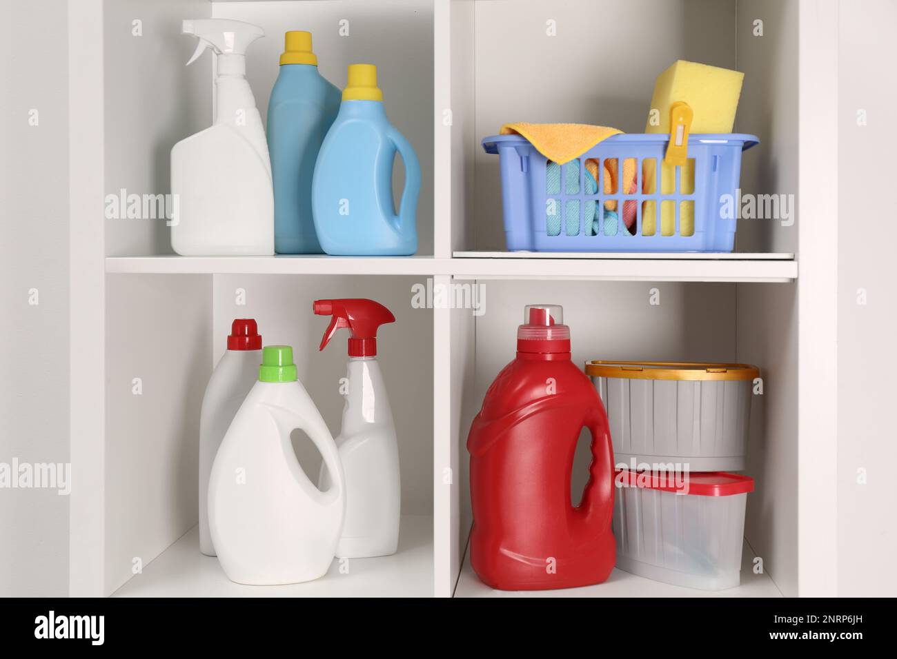 https://c8.alamy.com/comp/2NRP6JH/different-cleaning-supplies-and-tools-on-shelves-2NRP6JH.jpg