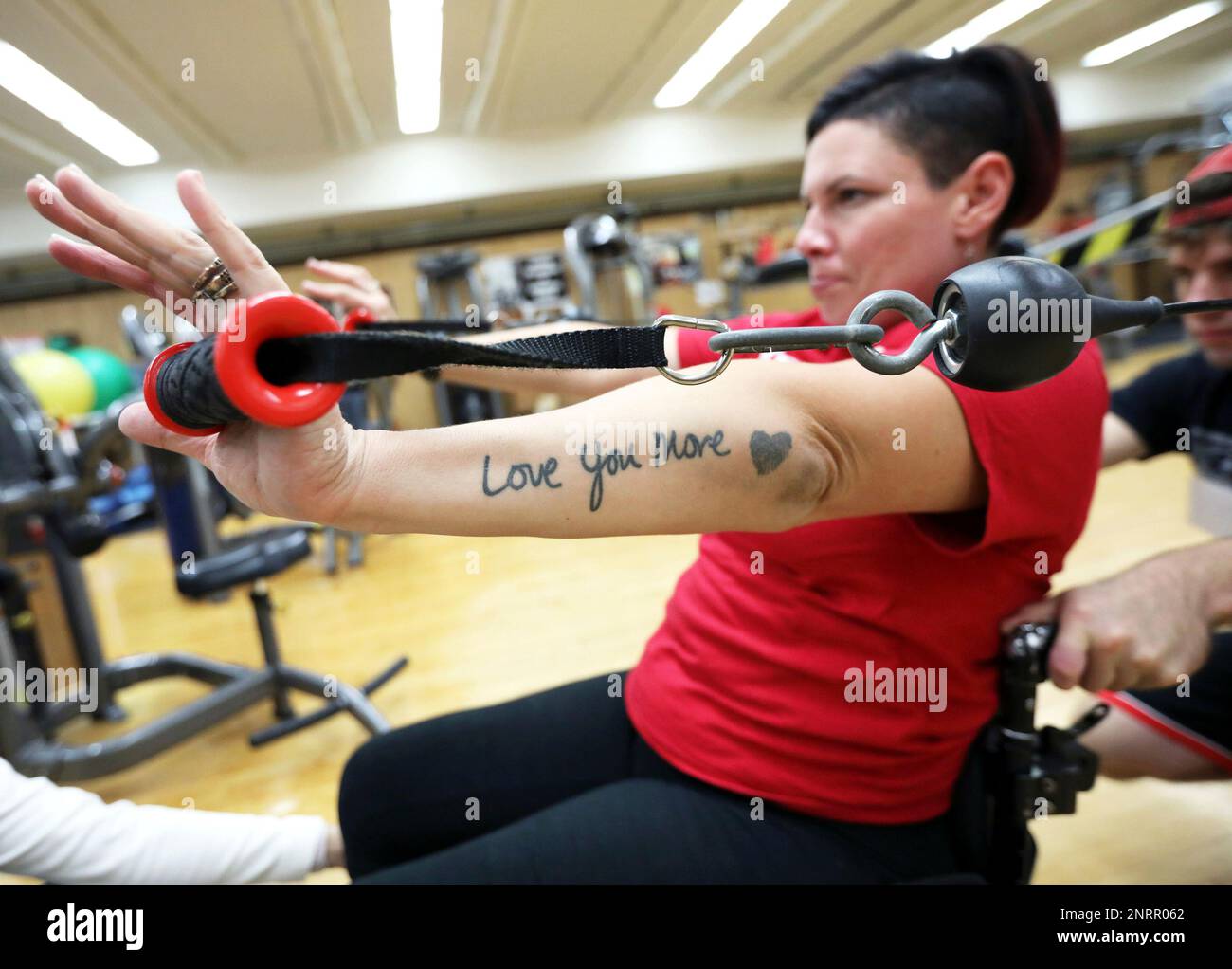 In this Friday, Oct. 4, 2019 photo, Autumn Neugent, Ms. Wheelchair Wisconsin, works with UW