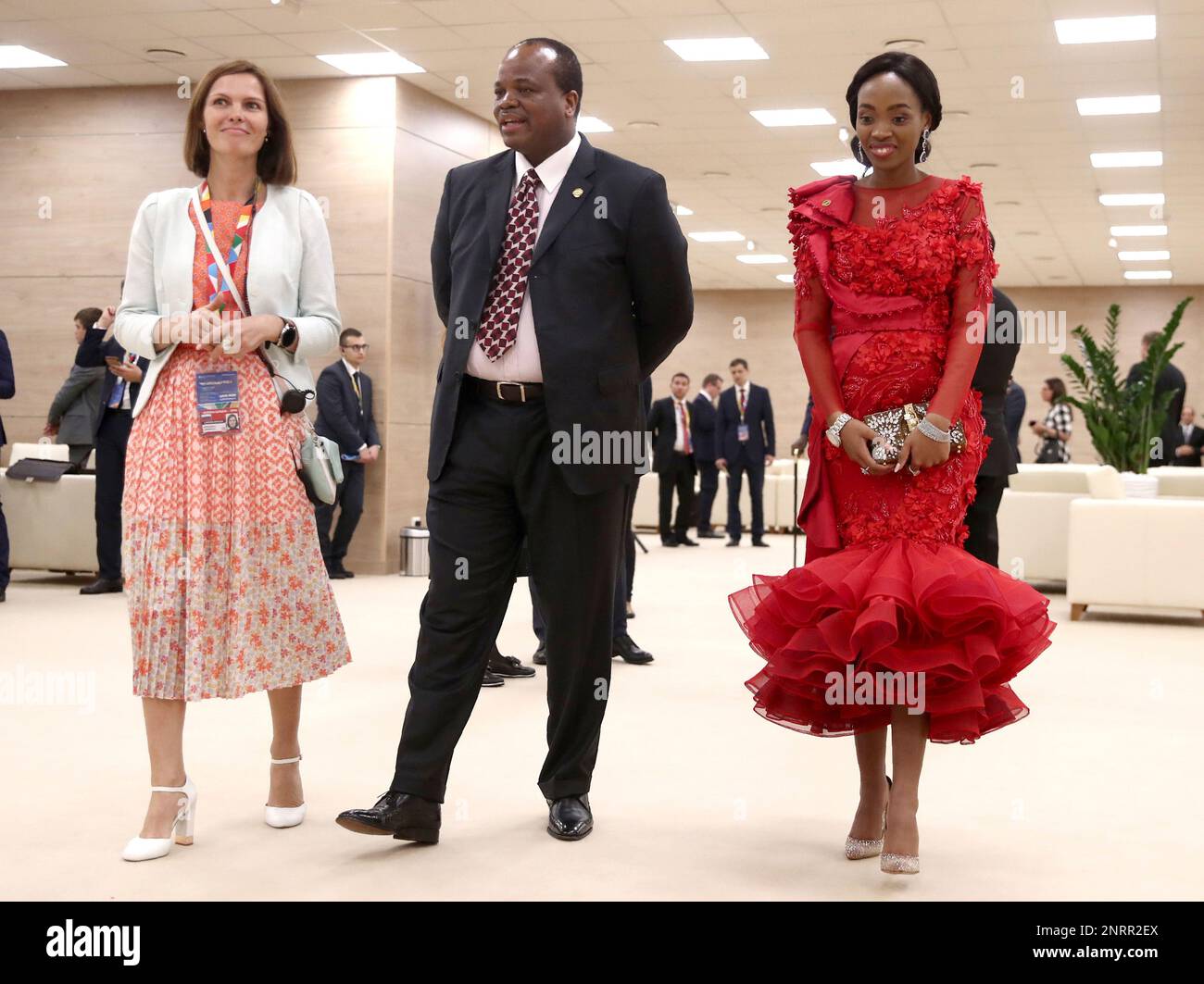 King Mswati III, of Swaziland and his wife, right, arrive to attend a  welcome ceremony of the Russia-Africa summit in the Black Sea resort of  Sochi, Russia, Wednesday, Oct. 23, 2019. (Valery