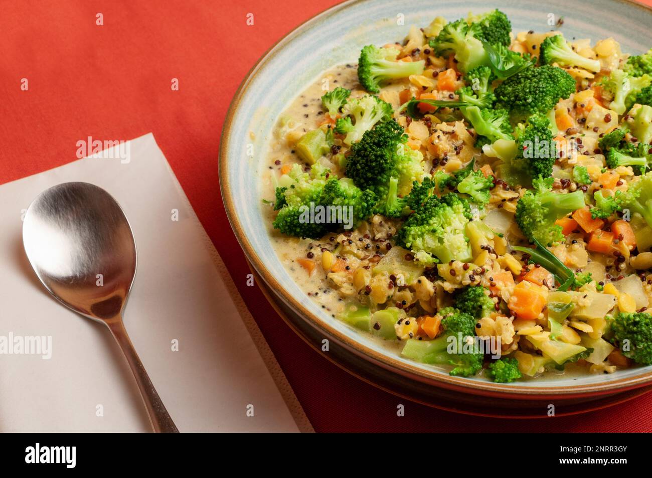 Ayurvedic kitchari vegan with broccoli, carrots and quinoa in a bowl