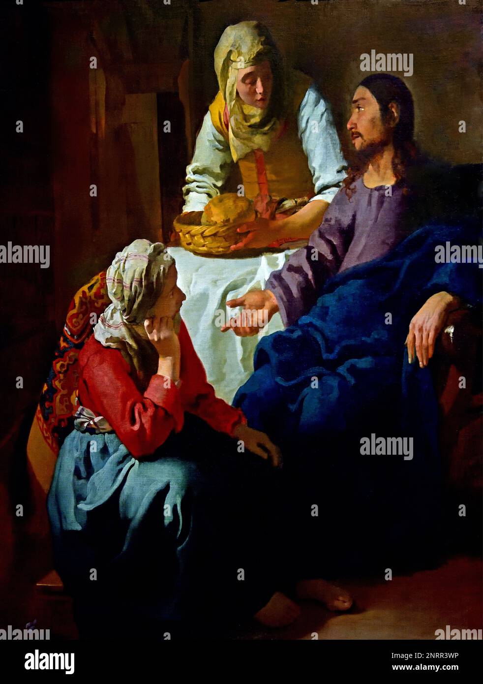 Christ in the house of Mary and Martha 1654-1655 by Johannes Vermeer or Jan Vermeer 1632 - 1675, Delft,  The Netherlands, Dutch, Holland, ( Dutch painter in the Golden Age,  one of the greatest painters,   17th century. preferred timeless, subdued moments, remains enigmatic,  inimitable colour scheme and bewildering light content) Stock Photo