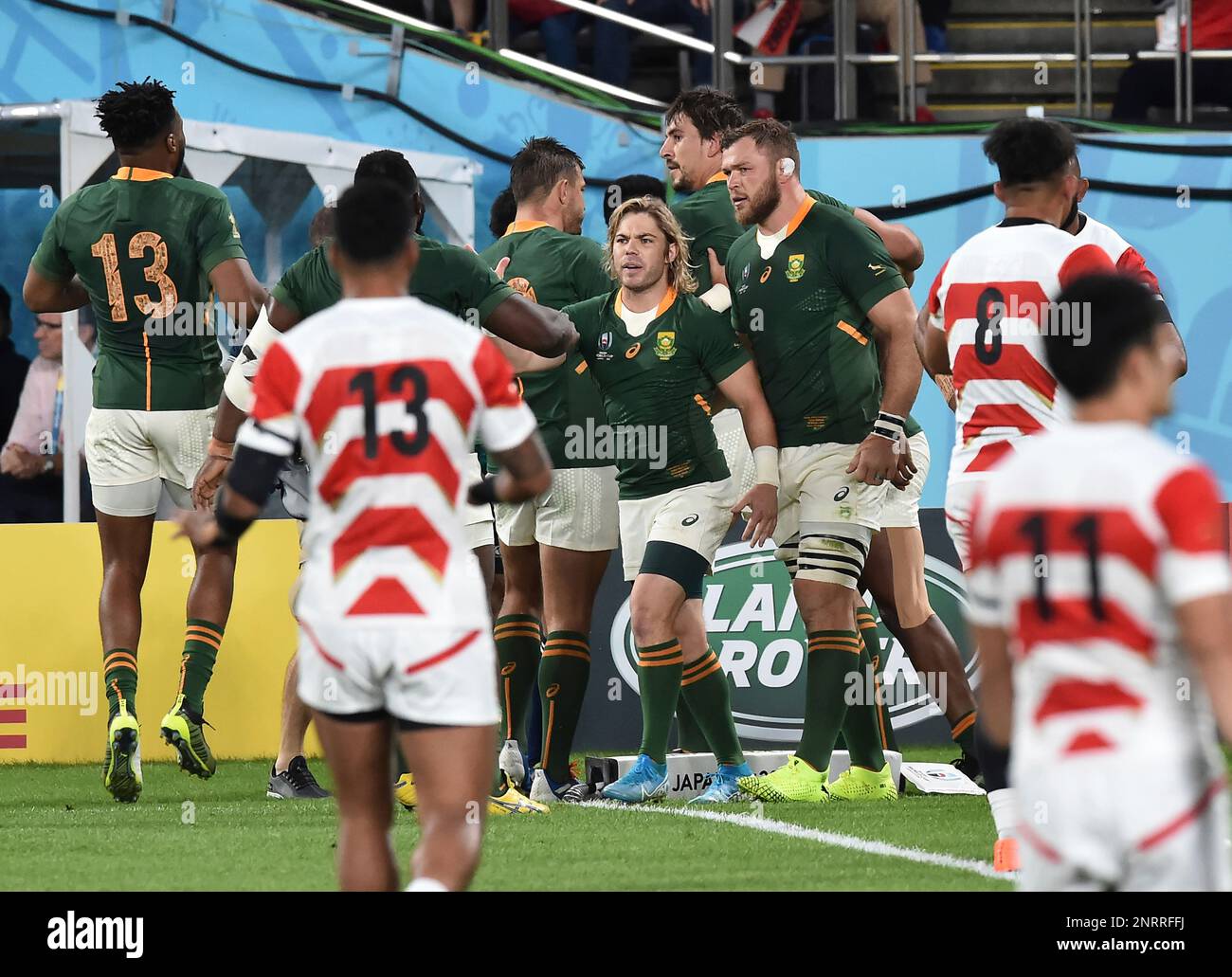 South Africa's team members celebrate after Makazole Mapimpi opened a