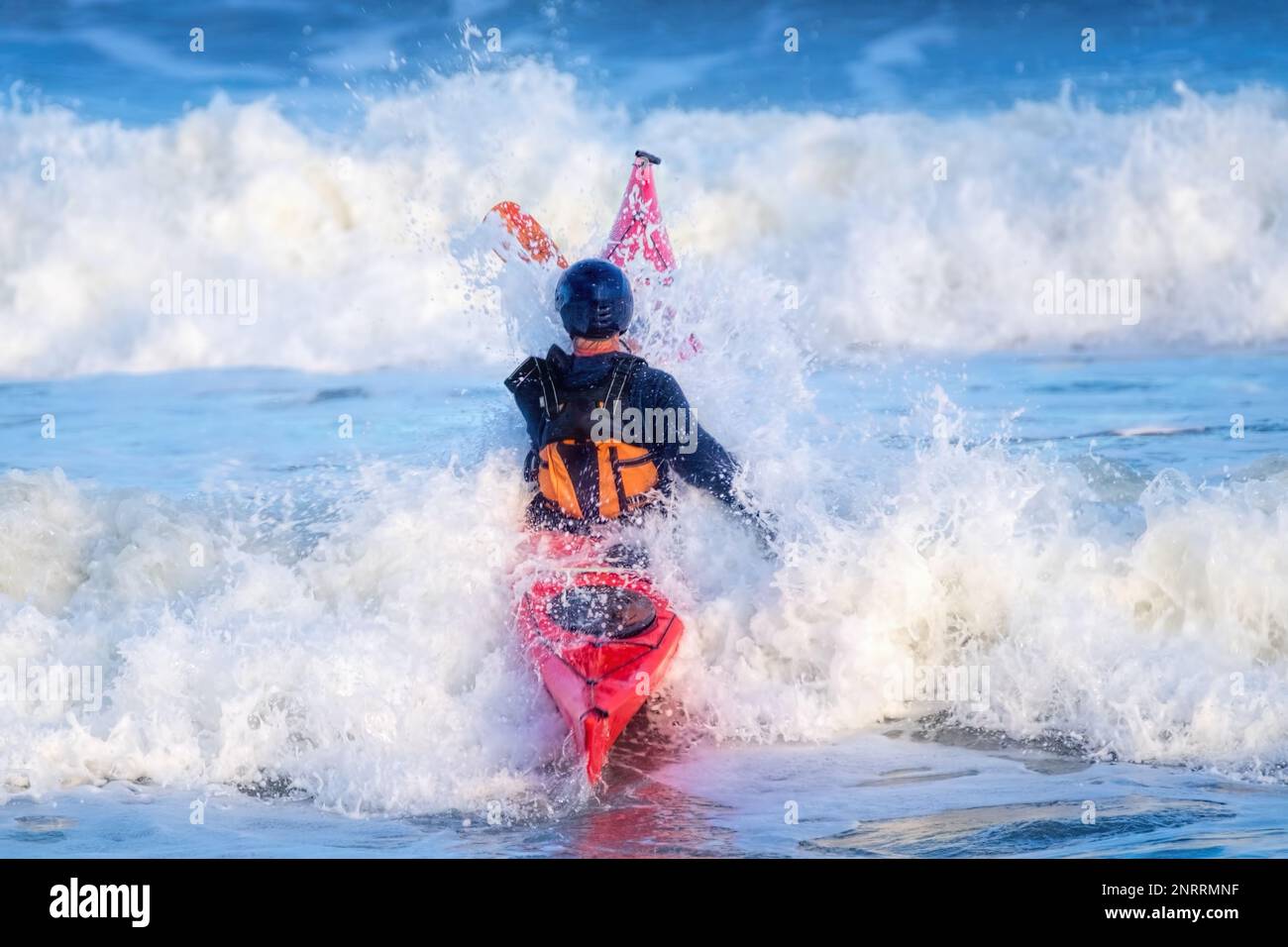 Kayaking in heavy surf Stock Photo Alamy
