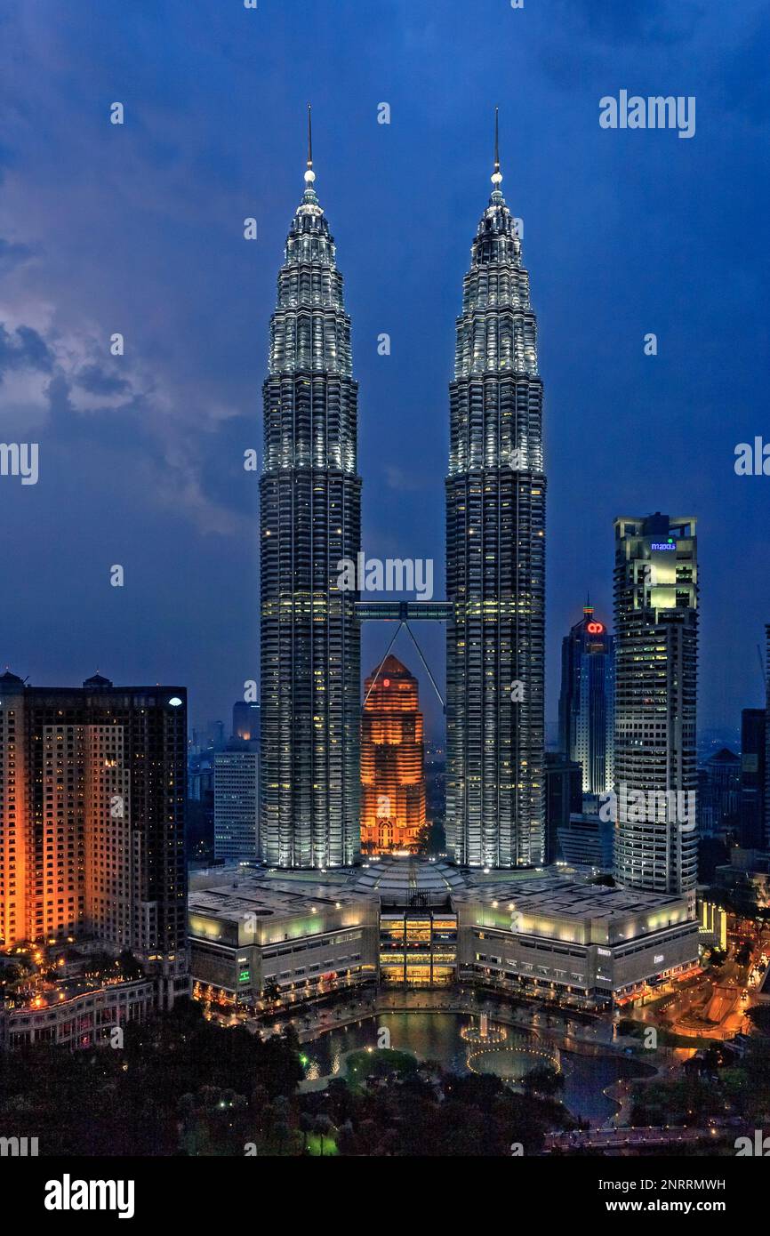 Twin Towers Kuala Lumpur, Petronas Towers, with dark blue storm clouds