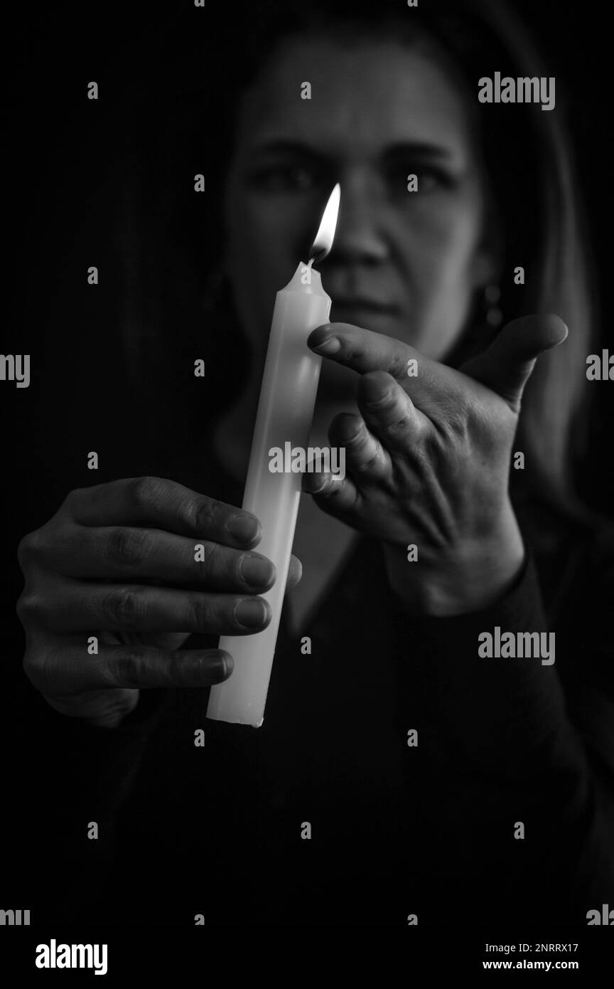 Woman candle Black and White Stock Photos & Images Alamy
