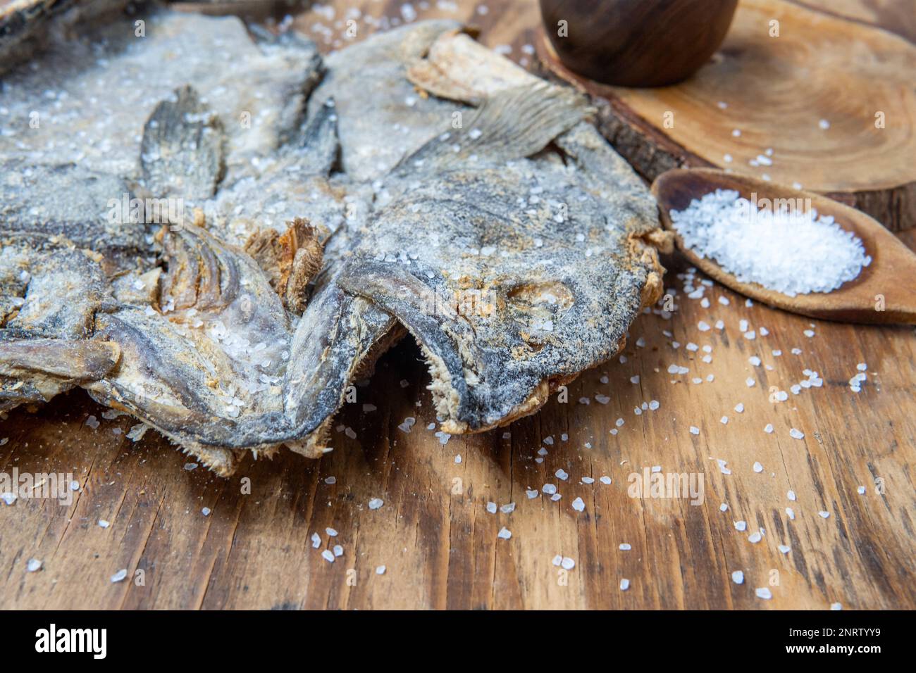 Dried and salted cod heads with skin and scales Stock Photo Alamy