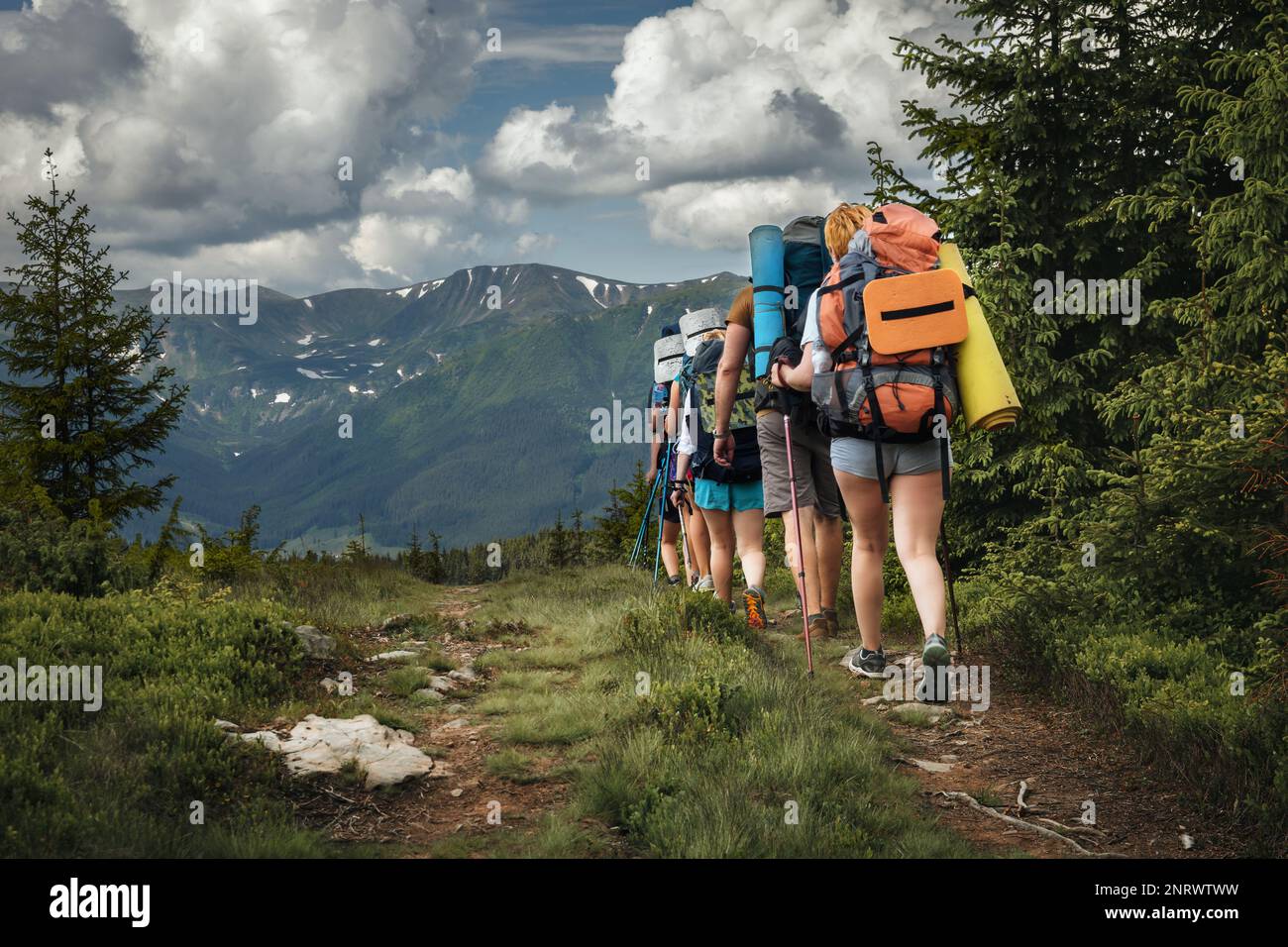 Group of friends hike in the mountains hi-res stock photography and ...