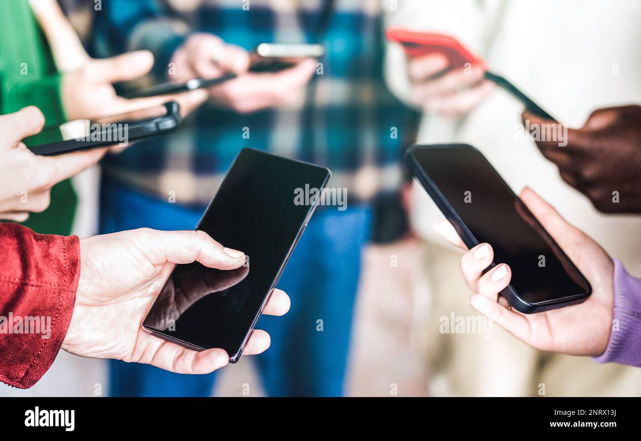 Closeup of igen people hand using mobile smart phones - Detail of web data users sharing images on social media networks with smartphones Stock Photo