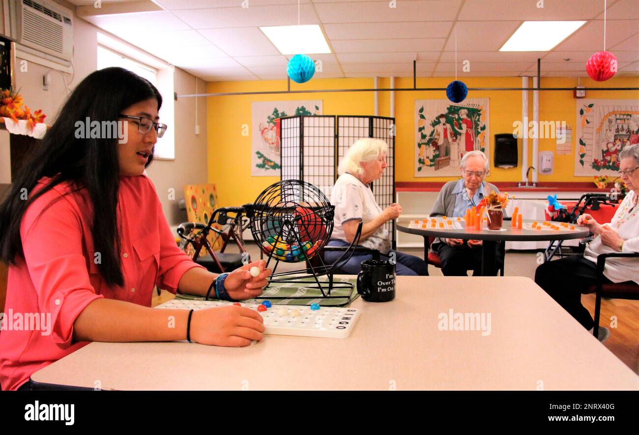 Ashley McGaw, a senior at Winona State University, runs the bingo game