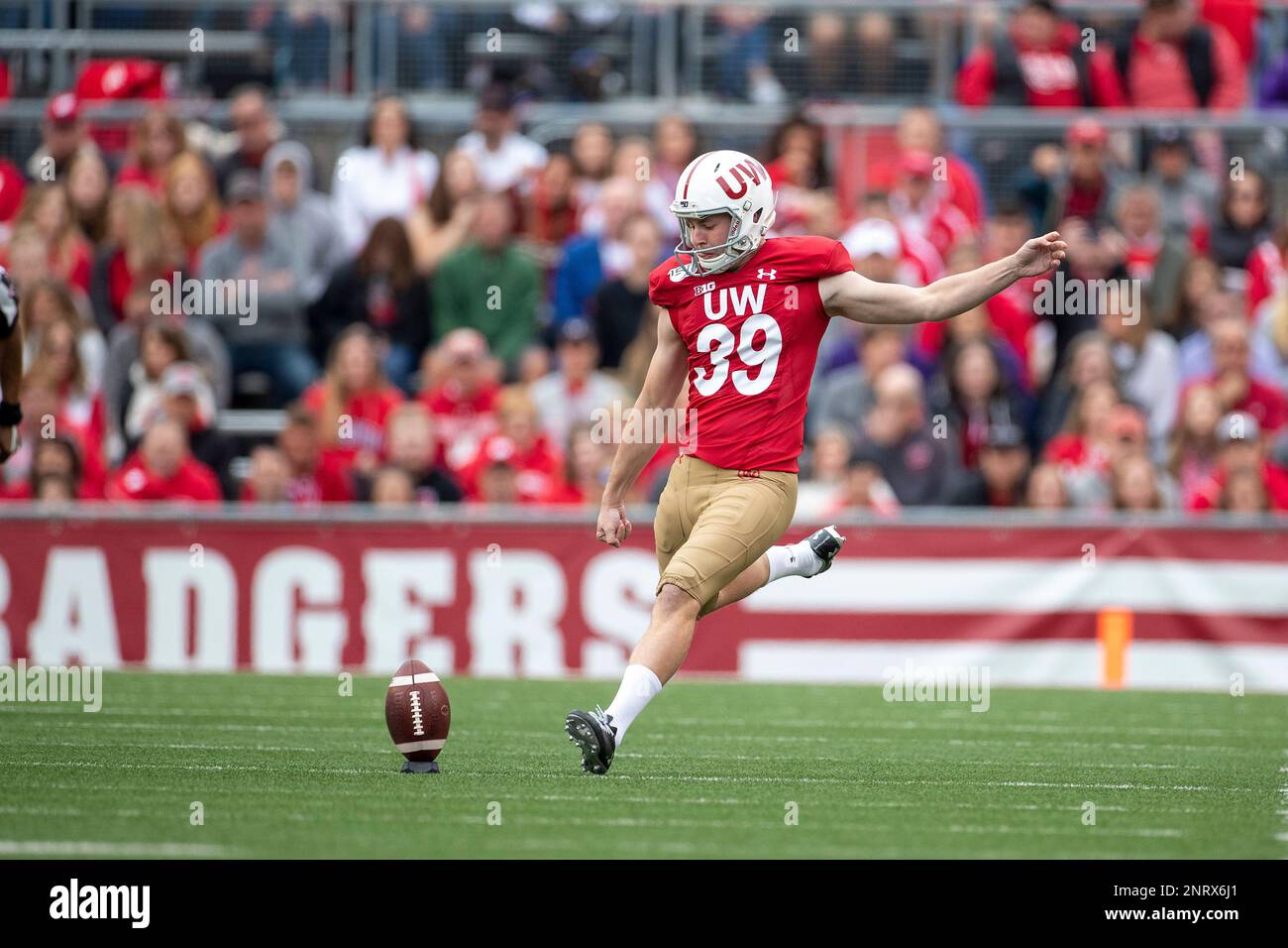 Wisconsin Kicker Wisconsin Badgers kicker Zach Hintze (39) kicks off during an NCAA Big ...