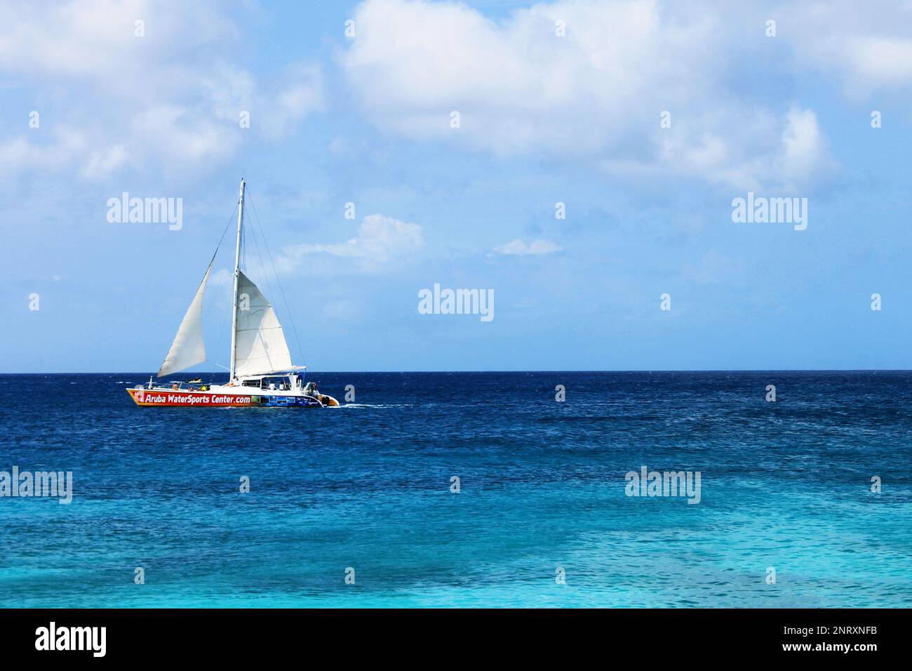 Palm Beach, Noord, Aruba - March 10, 2022. A Catamaran tour boat in the Caribbean sea, off the coast of Aruba Stock Photo