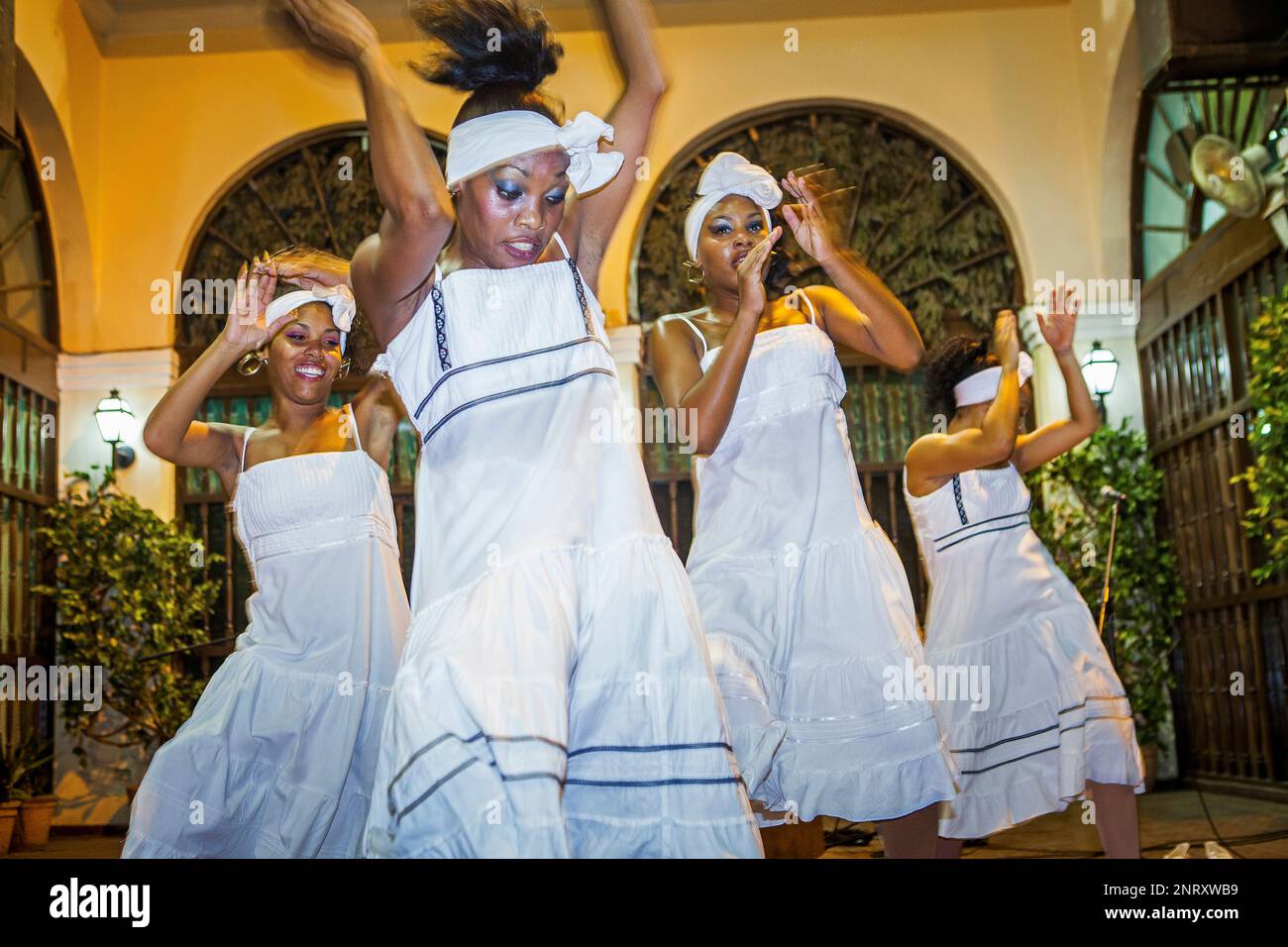 Afro-Cuban Santeria Music and Dancers, Colorfully dressed m…