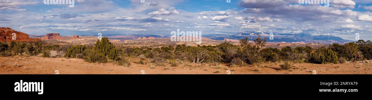 Panoramic view of Arth's Pasture from the Monitor & Merrimac Buttes at left to the La Sal Mountains at right.  Moab, Utah. Stock Photo