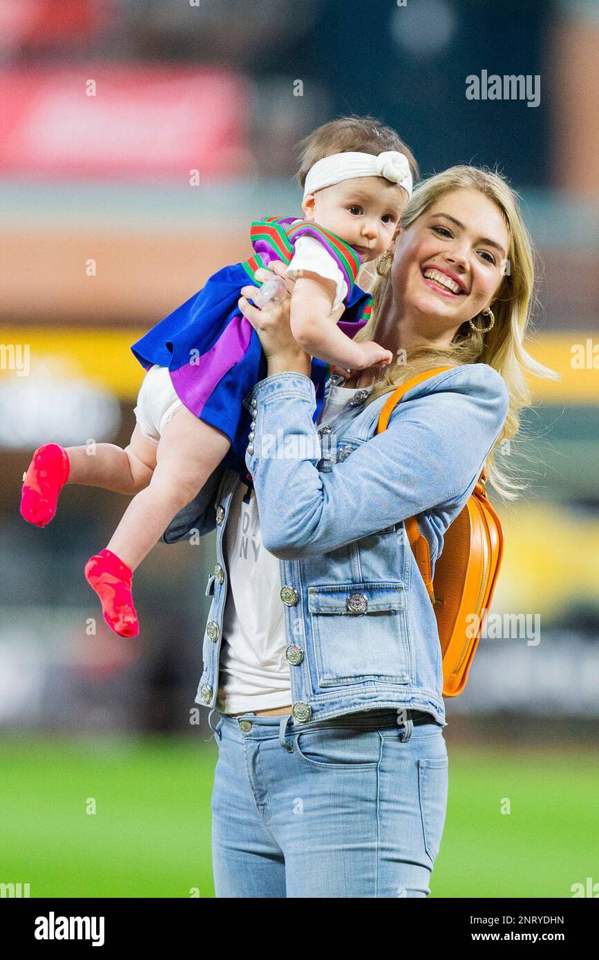 HOUSTON, TX - SEPTEMBER 22: Kate Upton holding her baby daughter Genevieve  Upton Verlander on the field after a baseball between the Houston Astros  and the Los Angeles Angels on September, 22