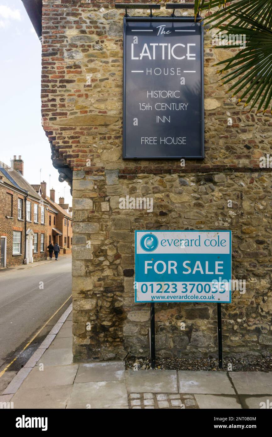 An Everard Cole For Sale sign on the 15th century Lattice House public house in Chapel Street, King's Lynn, Norfolk. Stock Photo