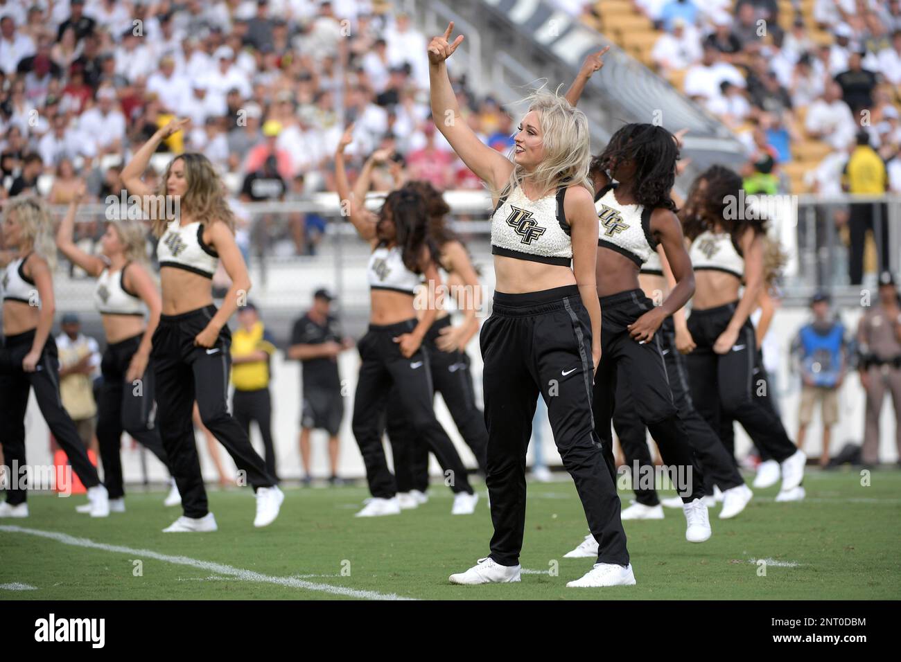 Central Florida KnightMoves dance team members perform during the first half of an NCAA college football game against Stanford Saturday, Sept. 14, 2019, in Orlando, Fla. (Phelan M. Ebenhack via AP) Stock Photo