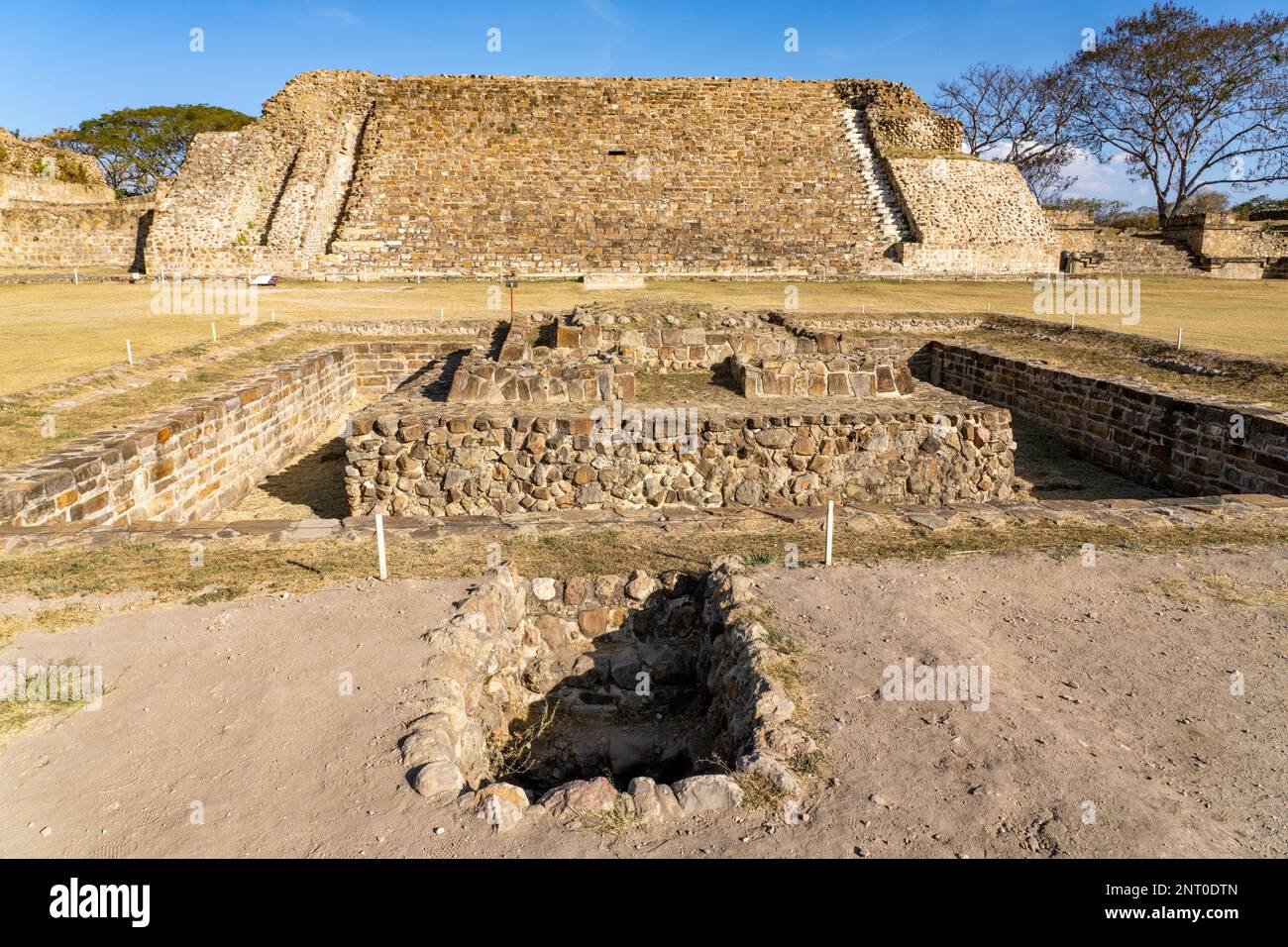 The Adoratorio with the opeing of tunnel in front in the pre-Hispanic Zapotec ruins of Monte Alban in Oaxaca, Mexico.  Building P is in the background Stock Photo