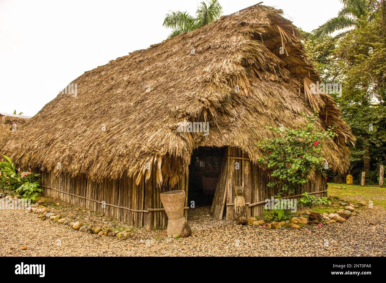 A typical thatched-roof hut of the indigenous Cuna people in Panama.  The Cuna are Amerindians who live on a the San Blas islands and in the Darien on Stock Photo