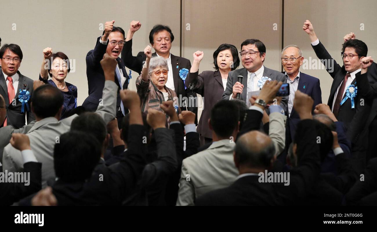 Sakie Yokota (center L), the mother of Megumi who was kidnapped in 1977 at  the age of 13, Hitomi Soga (center R), a former Japanese abductee, and  others attend a national meeting