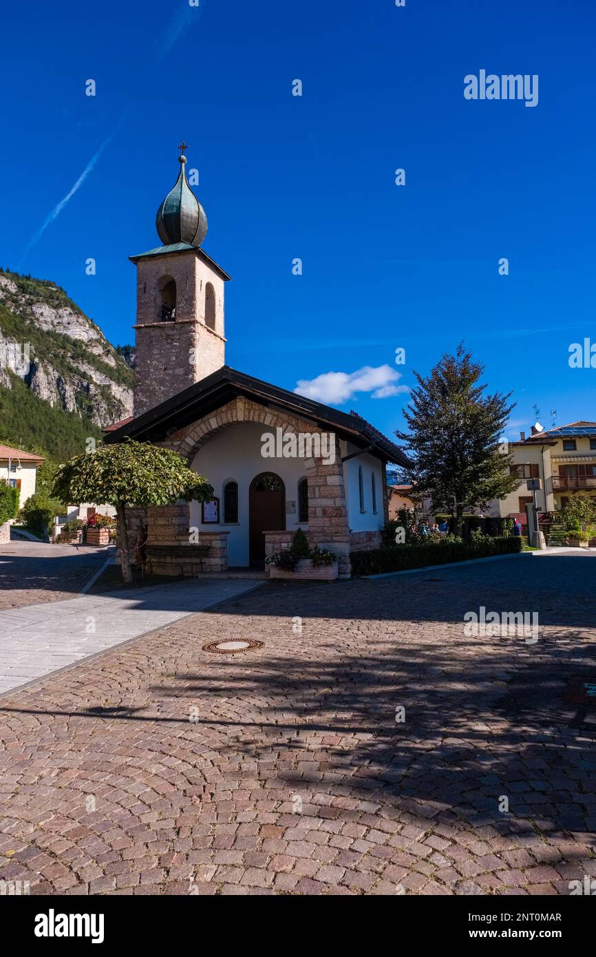 The church Chiesa San Rocco, located in the village of Fai della Paganella. Stock Photo