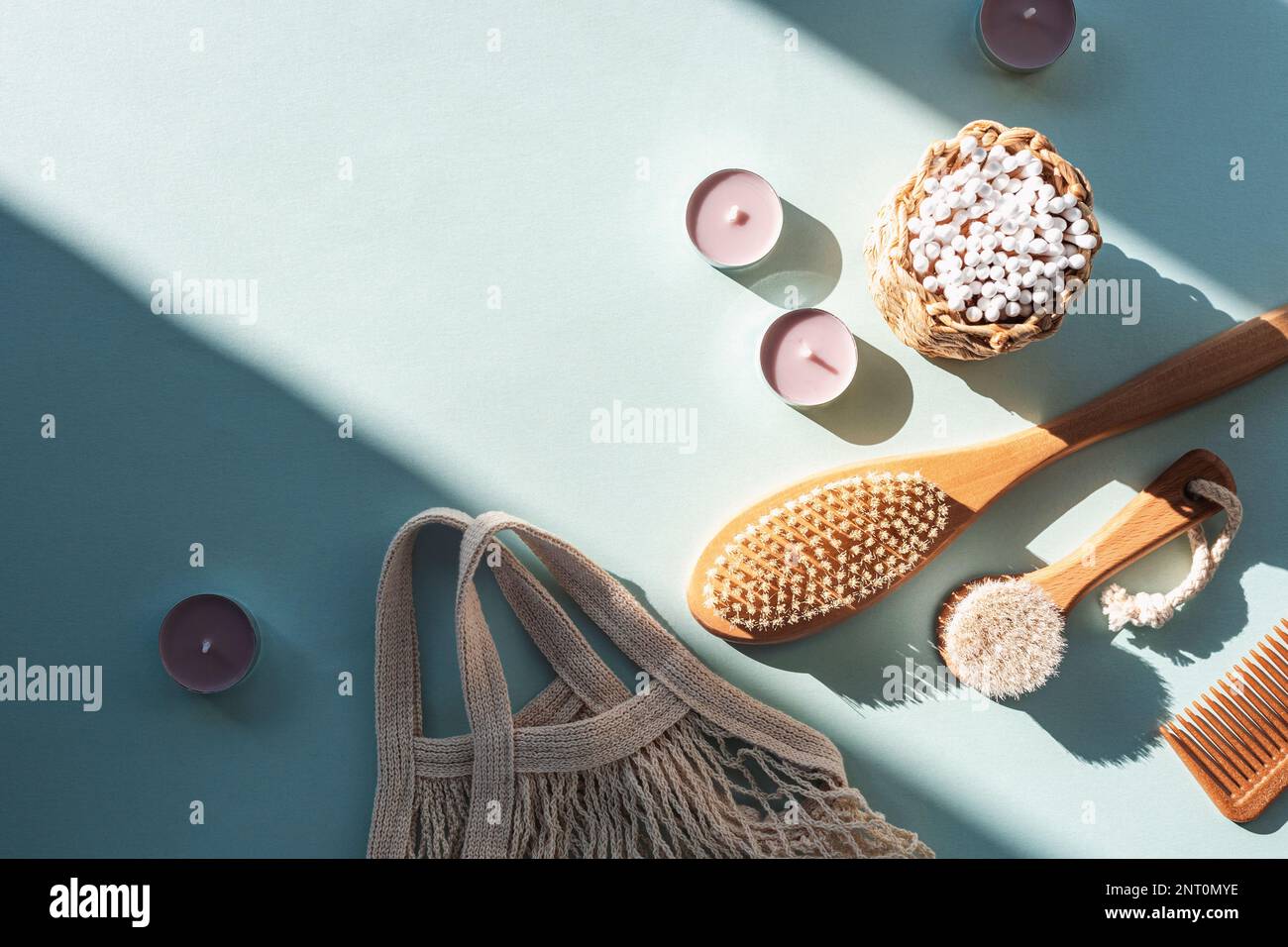 Natural cosmetics, wooden brushes, ear cleaning sticks, candles and