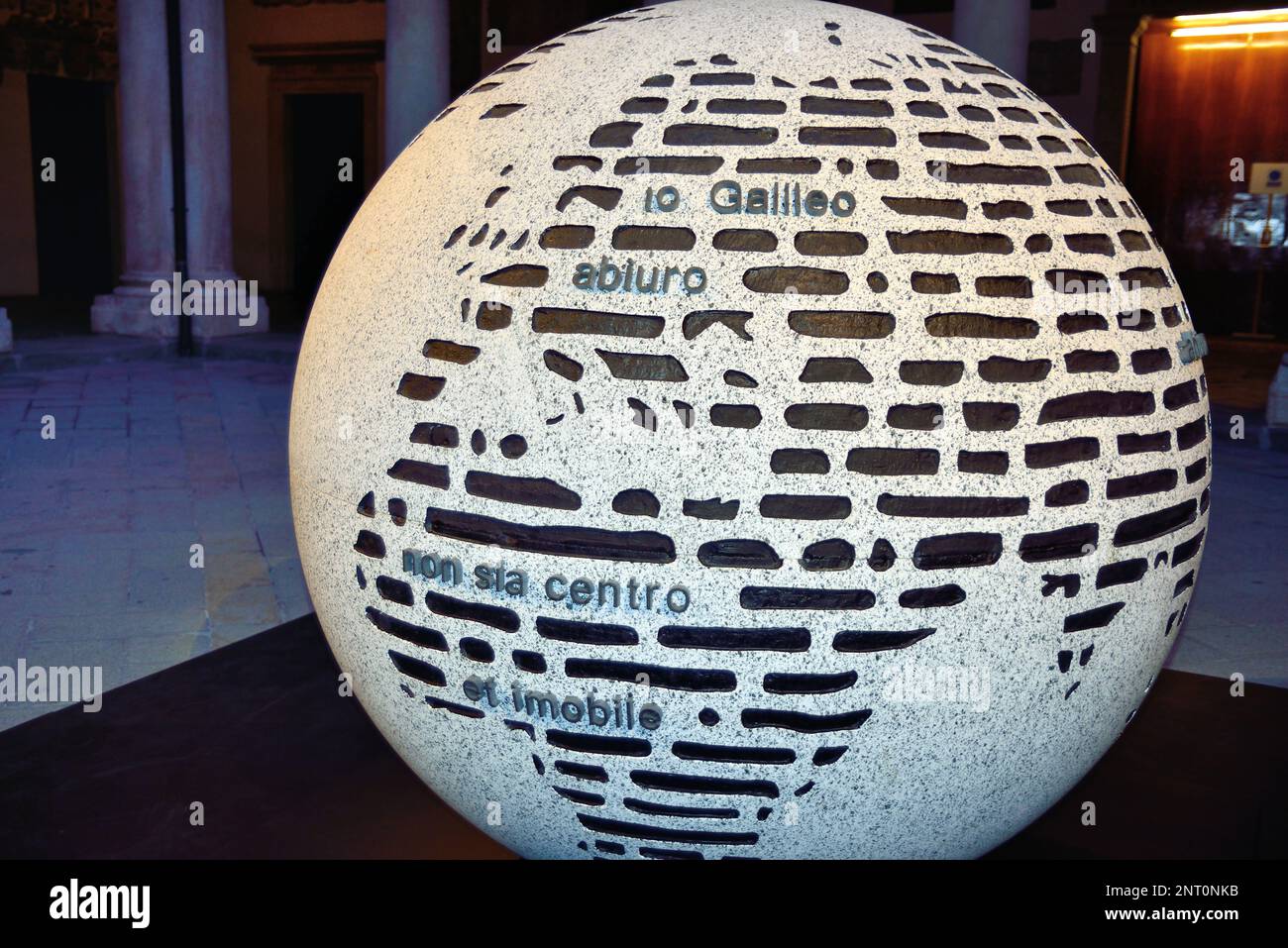 Padua, Italy. 27th February, 2023. A granite globe is the sculpture 'The abjuration of Galileo' by the conceptual artist Emilio Isgrò was inaugurated in the ancient courtyard of the University of Padua. Credit : Ferdinando Piezzi/Alamy Live News Stock Photo