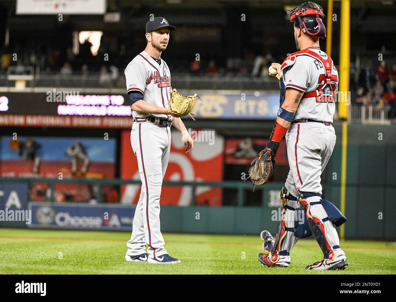 WASHINGTON, DC - SEPTEMBER 13: Atlanta Braves relief pitcher Jerry Blevins  (50) is congratulated by catcher Tyler Flowers (25) following the game  against the Washington Nationals on September 13, 2019, at Nationals